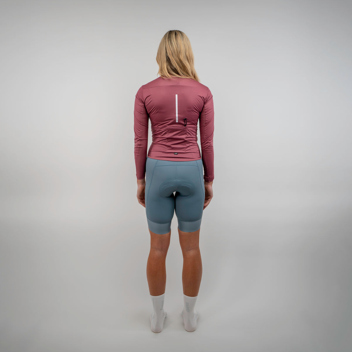 Womens Omni Wind Jacket [Dark Blush]