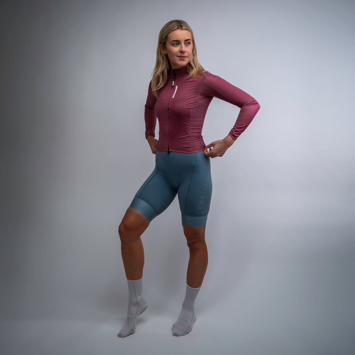 Womens Omni Wind Jacket [Dark Blush]
