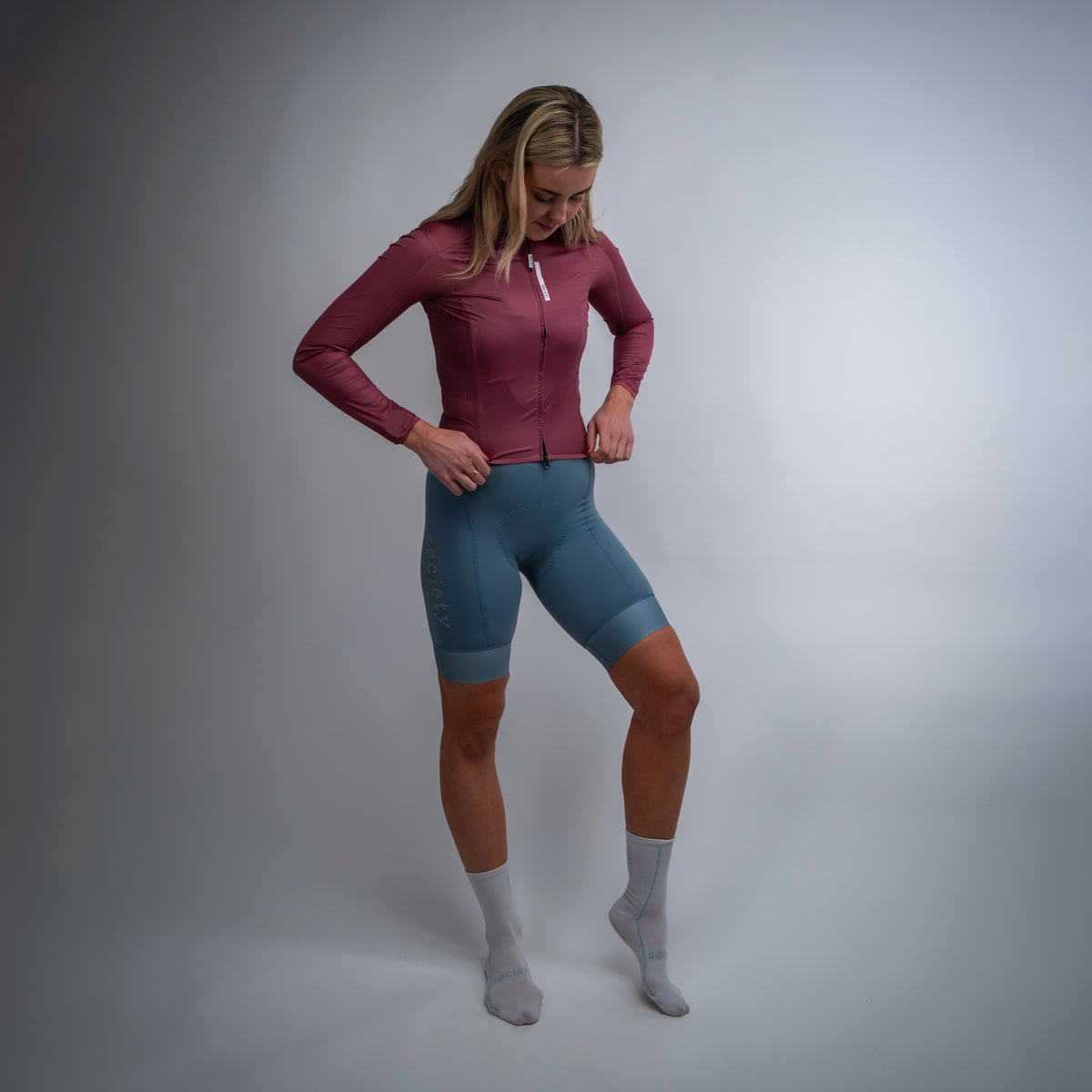 Womens Omni Wind Jacket [Dark Blush]