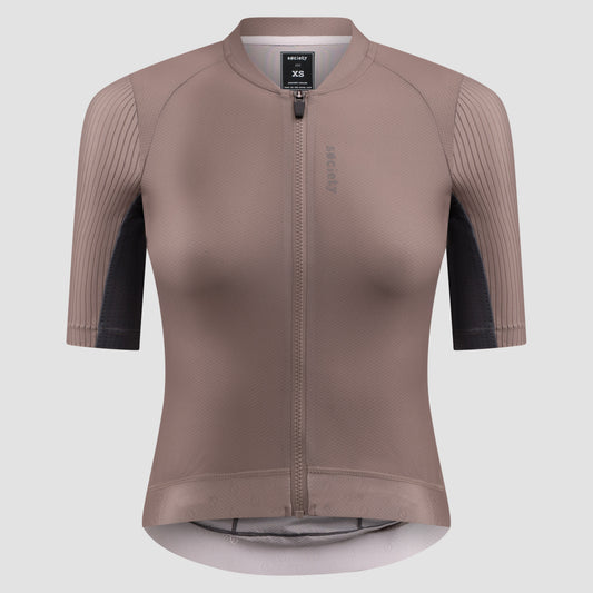 A women's short-sleeve cycling jersey in a muted taupe-brown color, featuring dark charcoal ribbed sleeves and a full-length front zipper. The brand 'Selle San Marco' is visible on the chest and inner neck label.
