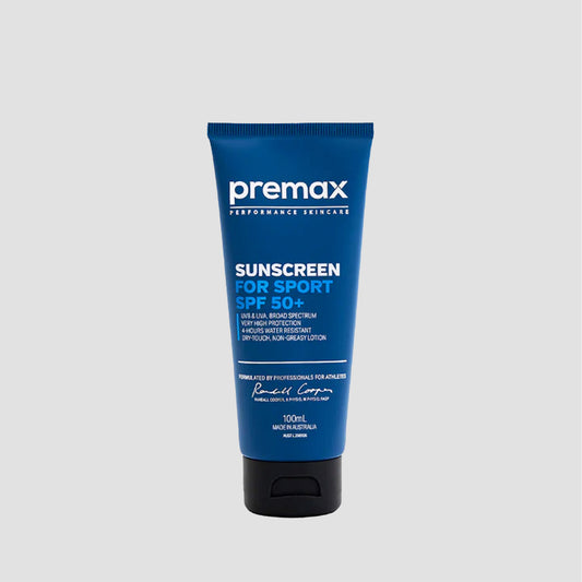 tube of blue sunscreen on a grey background